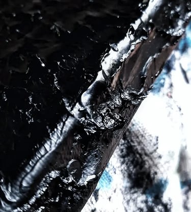 a close up of a black and white umbrella