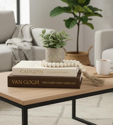 Luxury decorative books styled on a modern coffee table with neutral living room decor