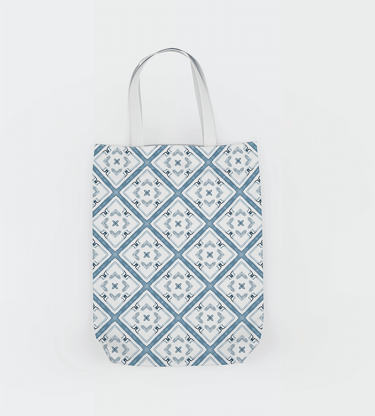 a baguet bag with a blue and white geometric  pattern