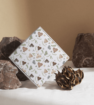 a gift or packaging box with a butterfly pattern