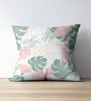 a decorative pillow with a tropical print