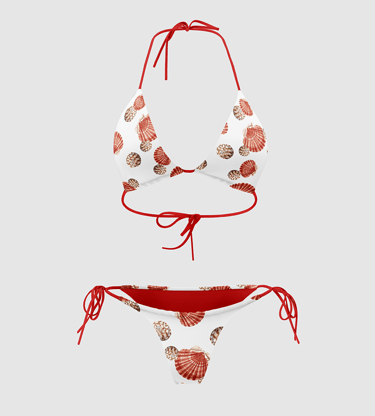 a bikini top with seashells and shells on it