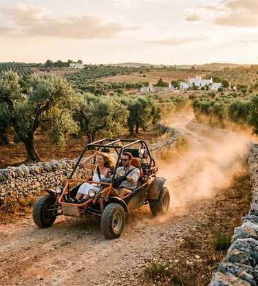 Couple driving orange buggy on dusty Puglia trail through olive groves at golden hour