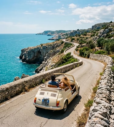 Couple driving cream Fiat 500 Spiaggina along winding Puglia coastline on vintage car tour