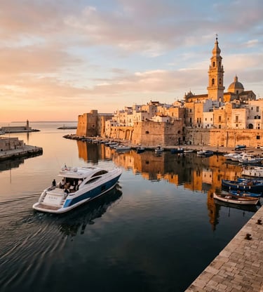 Luxury motor yacht leaving a historic Puglian harbour at golden hour with a baroque church tower