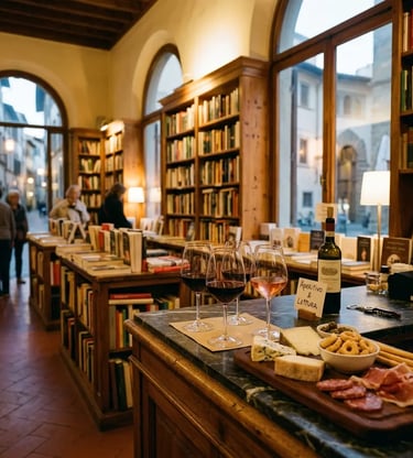 Wine glasses with charcuterie and cheese inside Libreria Liberrima bookstore bar in Bari, Puglia