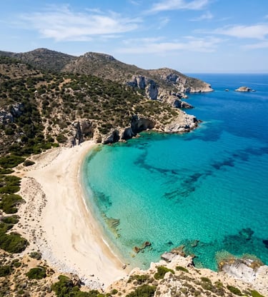 Aerial view of pristine beach and turquoise water at Poliegos island Greece