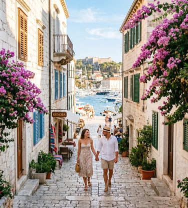 Couple walking hand in hand through bougainvillea-lined stone street in Hvar Town Croatia