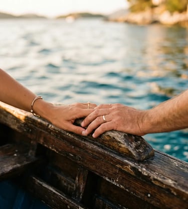 Close up of man and woman hands touching on weathered wooden boat rail at sea