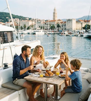 Family enjoying croissants and coffee on catamaran deck in Split harbor morning