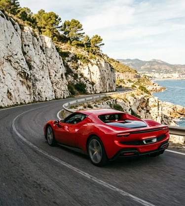 Ferrari 296 GTB cornering on a Garraf Massif coastal road near Barcelona