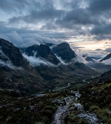 Glencoe Valley at Dawn With Low Clouds Threading Through the Highland Mountain Ridges