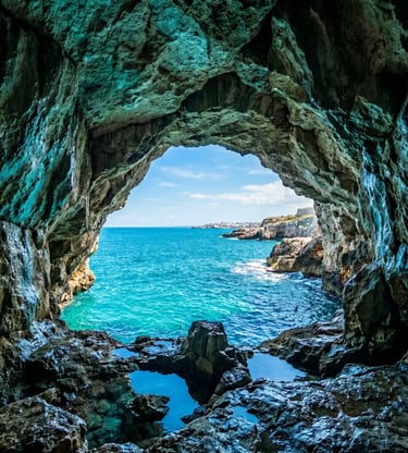 Rocky sea cave arch opening to turquoise Adriatic Sea near Monopoli