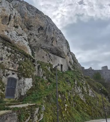 Dramatic limestone cliffs and stone structures at San Giovanni Rotondo, Italy