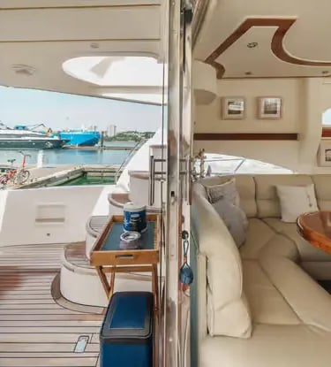 Luxury yacht aft deck and lounge with teak flooring docked at Porto marina, Portugal