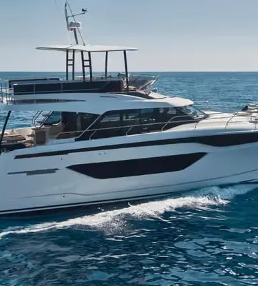 2025 Luxury Powercat Prestige M48 catamaran cruising on calm Mediterranean Sea