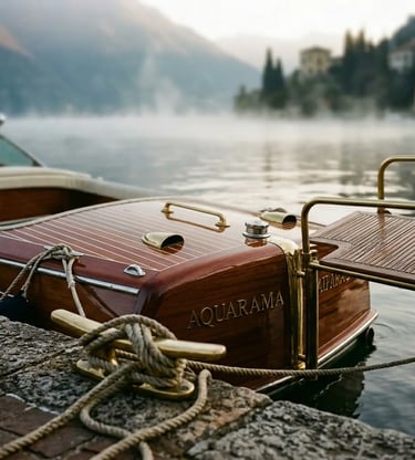Vintage Aquarama wooden boat with brass fittings moored on misty Lake Como at dawn