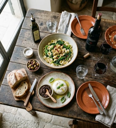 Traditional Puglian lunch with orecchiette, burrata, Primitivo wine and olive oil at rustic masseria