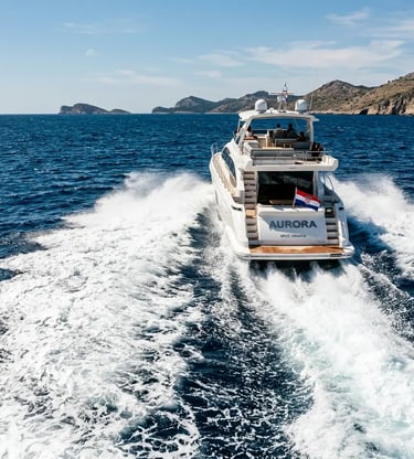 Azimut 62S Aurora cutting through deep blue Adriatic Sea with powerful twin engine wake