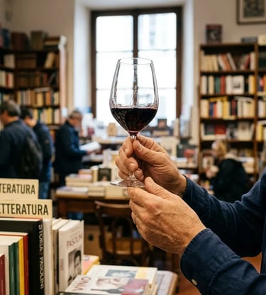 Oenologist holding a glass of Primitivo red wine inside a Bari bookstore during tasting