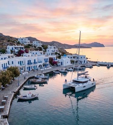 Private catamaran departing Pollonia fishing village harbor at sunrise, Milos Greece luxury tour