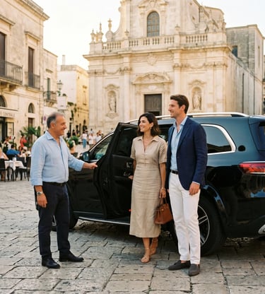 Elegant couple greeted by private driver in Martina Franca square during exclusive Puglia day tour