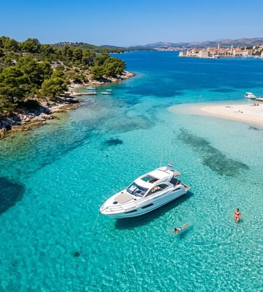 Speedboat anchored in the Blue Lagoon near Trogir with swimmers in shallow turquoise water