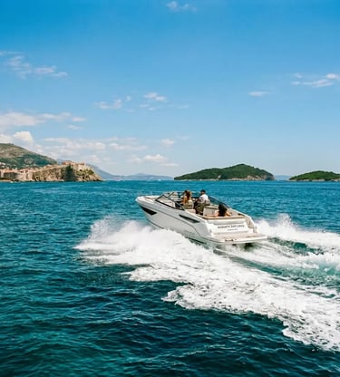 Private speedboat cruising past Dubrovnik old town toward the Elaphiti Islands