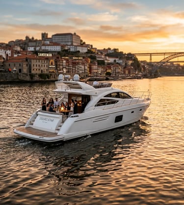 Luxury yacht Douro Star cruising the Douro River in Porto at golden hour sunset