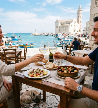 Pet-friendly seafood lunch at Trani harbor with couple toasting wine and dog resting below