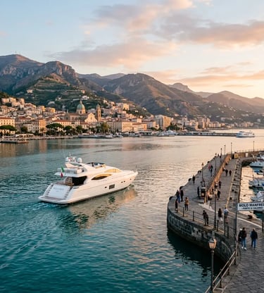 White boat departing Molo Manfredi pier in Salerno at sunset with mountains in background