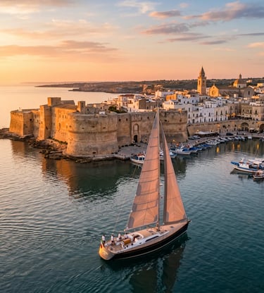 Sailboat passing Otranto Aragonese castle at golden hour sunset, Puglia Italy