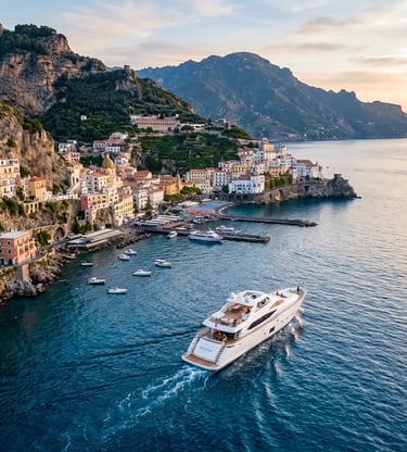 Luxury yacht departing Positano harbor along the Amalfi Coast at golden hour, aerial view