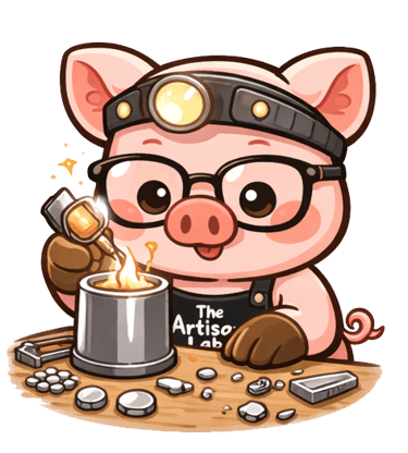 The Artisan Lab Designs mascot Milo is melting the silver with a torch