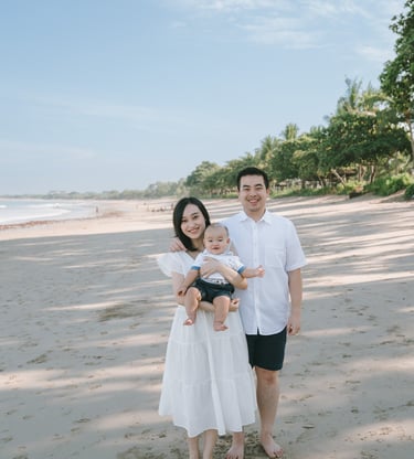 Family walking together on the beach at Intercontinental Jimbaran during a relaxed Bali family photography session