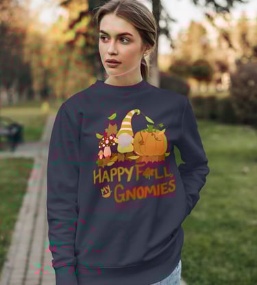 a woman wearing a happy fall sweatshirt that reads happy fall my gnomies with a gnome pumpkin leaves