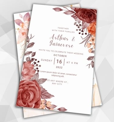 a wedding invitation with a floral design made in prime acrylics
