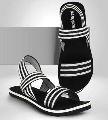 a pair of sandals with a black and white striped sandal