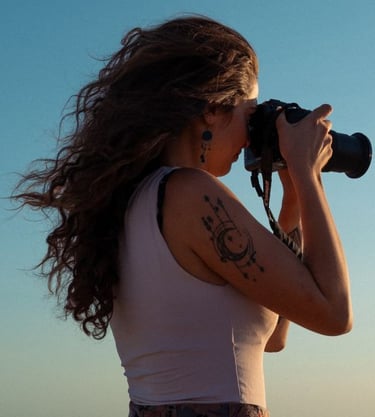 a woman taking a picture with a camera