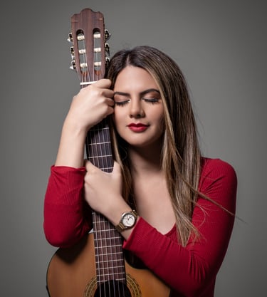 a woman with a guitar and a guitar