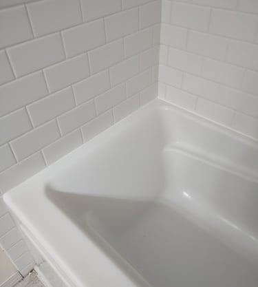 After re sealing around tub surround