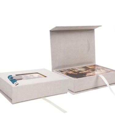 Linen photography presentation box with USB flash drive and photo prints.