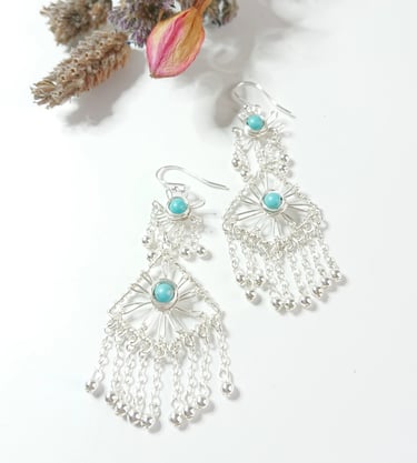 Statememt earrings of steel wire amd turquoose howlite, flower and chandelier design 