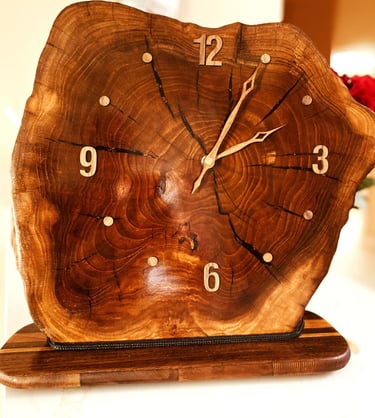 Edged wooden slab clock for table or shelf.
