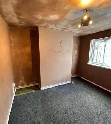 Smooth plasterwork on a residential wall by Franklins Plastering