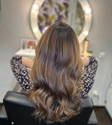 a woman with long hair and a hairdoodle