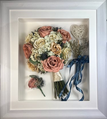 a side view preserved wedding bouquet heart shaped want and buttonhole