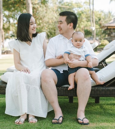 Family relaxing together at Intercontinental Jimbaran captured in a natural and candid Bali family photography session