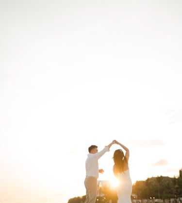 Couple Dancing together during golden hour prewedding photoshoot at Apurva Kempinski Bali beach
