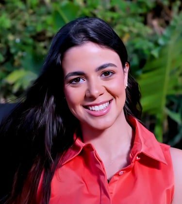 a woman with long hair and a red shirt